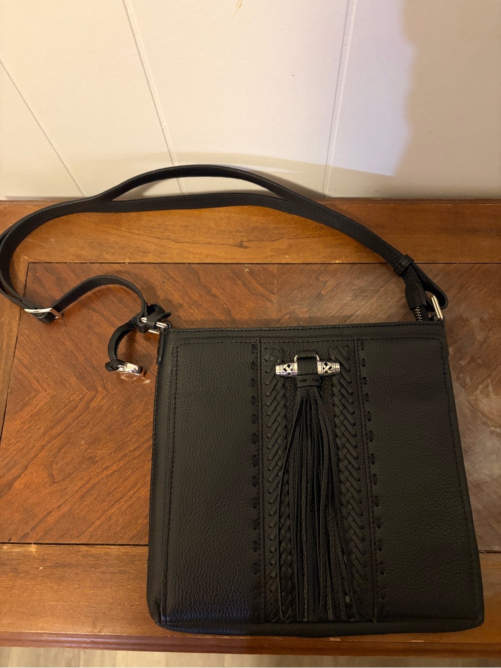 Brighton Black Leather Crossbody with Braided Tassel Detail